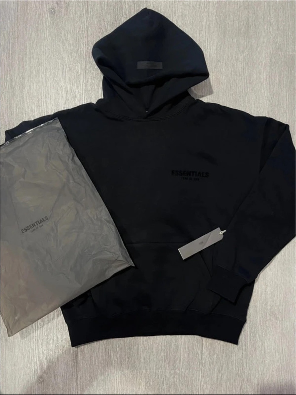 ESSENTIALS Black Pullover Hoodie with Subtle Logo with dust bag